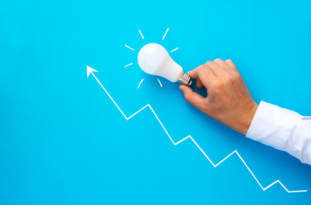 Businessman holding lightbulb. Business start-up goals to success, development and ideas motivation