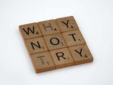 Image of scrabble tiles spelling out the words: Why, Not, Try.