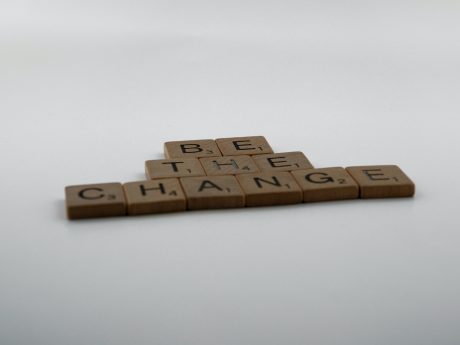 Image of scrabble pieces which spell out the words: Be the change